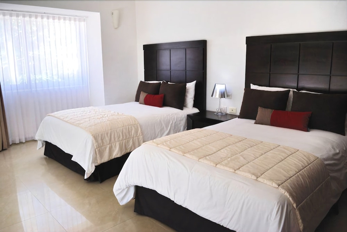 Imagen de la habitación del Hotel Bambu Suites - Near Quinta Avenida. Foto 10