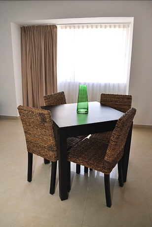 Imagen de la habitación del Hotel Bambu Suites - Near Quinta Avenida. Foto 13