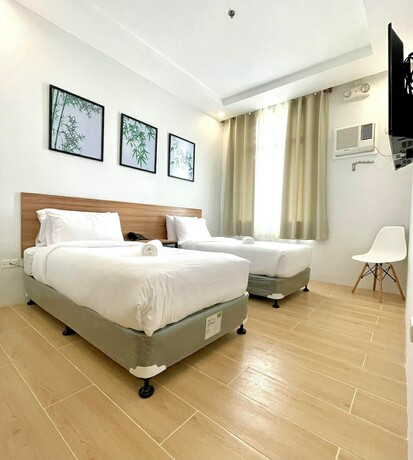 Imagen de la habitación del Hotel Bambu Suites, San Pedro. Foto 20
