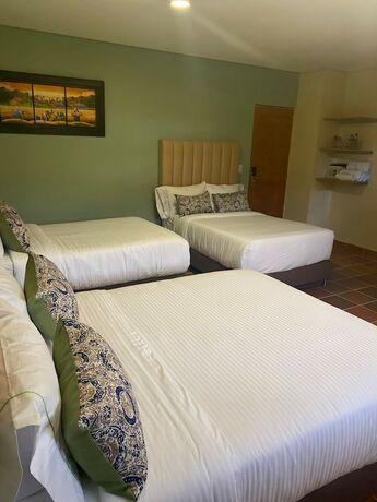 Imagen de la habitación del Hotel Bamb&uacute; Guatap&eacute;. Foto 14