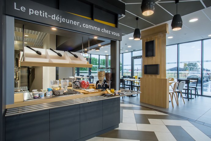 Imagen del bar/restaurante del Hotel B&B Annemasse St Cergues. Foto 3