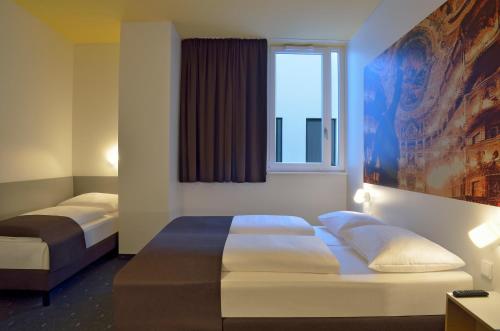 Imagen de la habitación del Hotel B&B Bayreuth. Foto 9