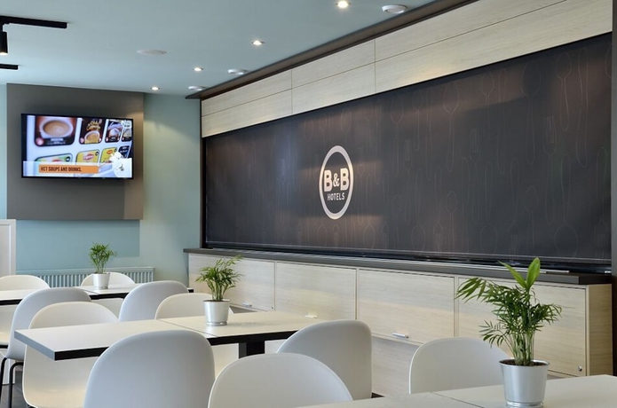 Imagen del bar/restaurante del Hotel B&B Berlin-dreilinden, Kleinmachnow. Foto 4