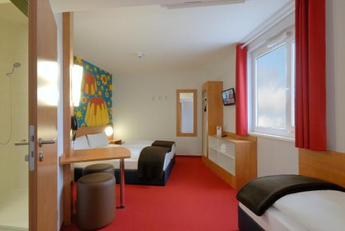 Imagen de la habitación del Hotel B&B Bielefeld City. Foto 8