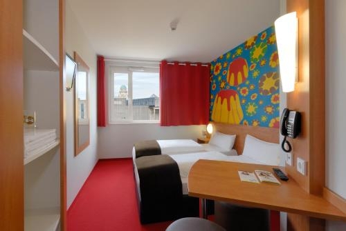 Imagen de la habitación del Hotel B&B Bielefeld City. Foto 9