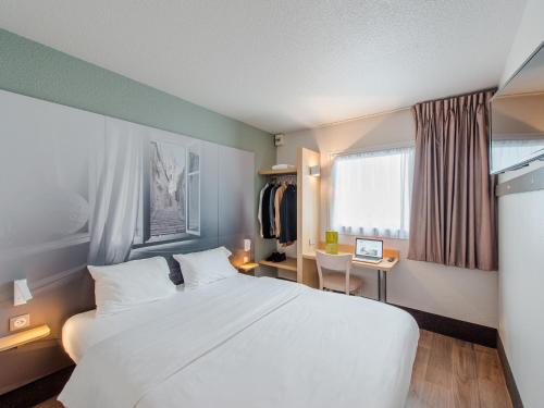 Imagen de la habitación del Hotel B&B Blois. Foto 10