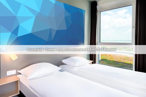 Imagen de la habitación del Hotel B&B Bochum-City. Foto 11