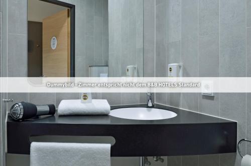 Imagen de la habitación del Hotel B&B Bochum-City. Foto 13