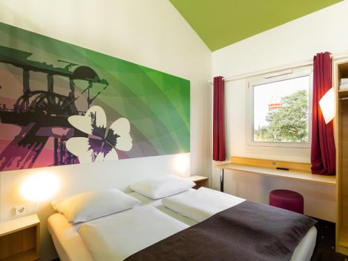 Imagen de la habitación del Hotel B&B Bochum-Herne. Foto 20