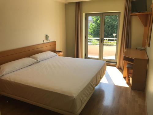 Imagen de la habitación del Hotel B&B Braga Lamacaes. Foto 10