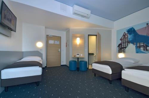 Imagen de la habitación del Hotel B&B Braunschweig-city. Foto 10