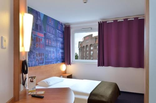 Imagen de la habitación del Hotel B&B Bremen City. Foto 5