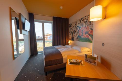 Imagen de la habitación del Hotel B&B Bremen-Überseestadt. Foto 5