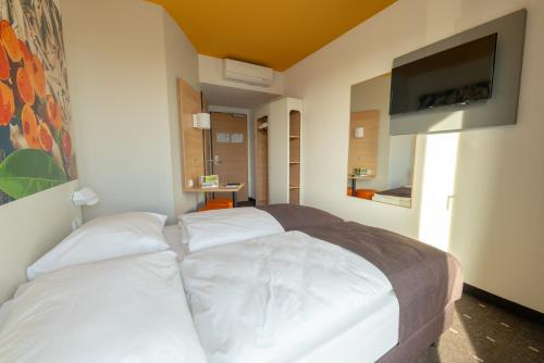 Imagen de la habitación del Hotel B&B Bremen-Überseestadt. Foto 7