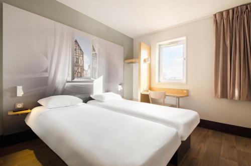 Imagen de la habitación del Hotel B&B CHARTRES Le Coudray. Foto 5