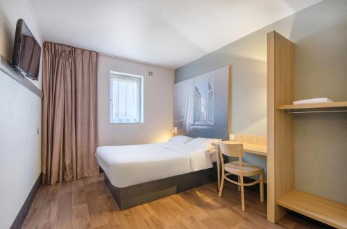 Imagen de la habitación del Hotel B&B CHARTRES Le Coudray. Foto 6