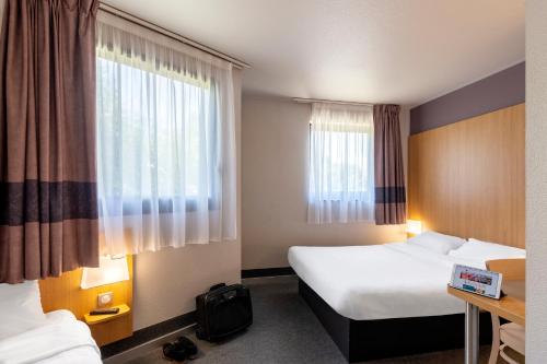 Imagen de la habitación del Hotel B&B Cholet Sud. Foto 9