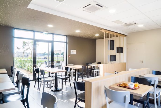 Imagen del bar/restaurante del Hotel B&B Colmar Expo. Foto 2