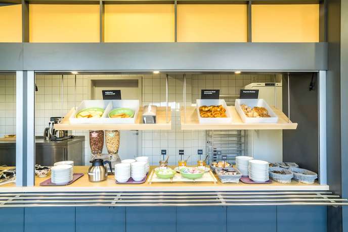 Imagen del bar/restaurante del Hotel B&B Colmar Expo. Foto 3