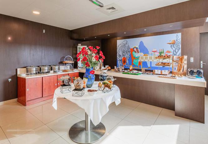 Imagen del bar/restaurante del Hotel B&B Colmar Liberté. Foto 5