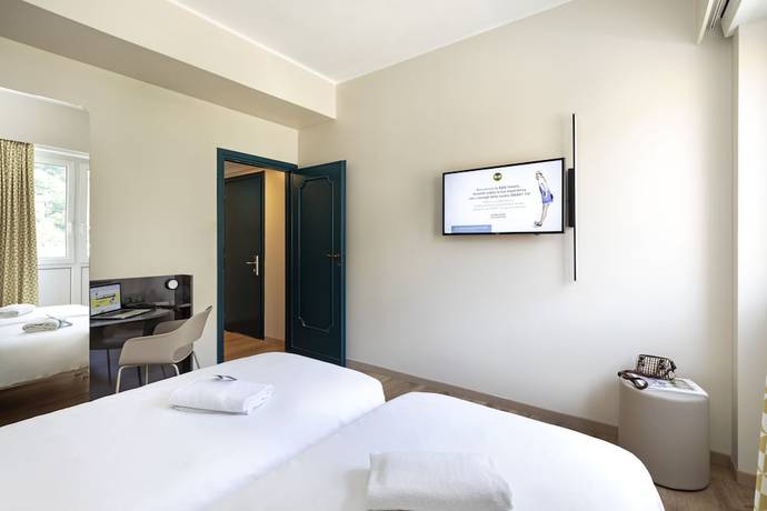 Imagen de la habitación del Hotel B&B Como City Center. Foto 8