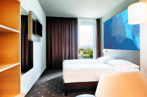 Imagen de la habitación del Hotel B&B Dessau. Foto 17