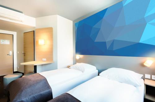 Imagen de la habitación del Hotel B&B Dessau. Foto 18