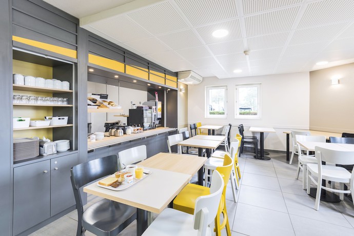 Imagen del bar/restaurante del Hotel B&B Dijon Nord Zenith. Foto 3