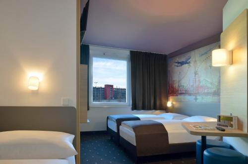 Imagen de la habitación del Hotel B&B Düsseldorf-Airport. Foto 9