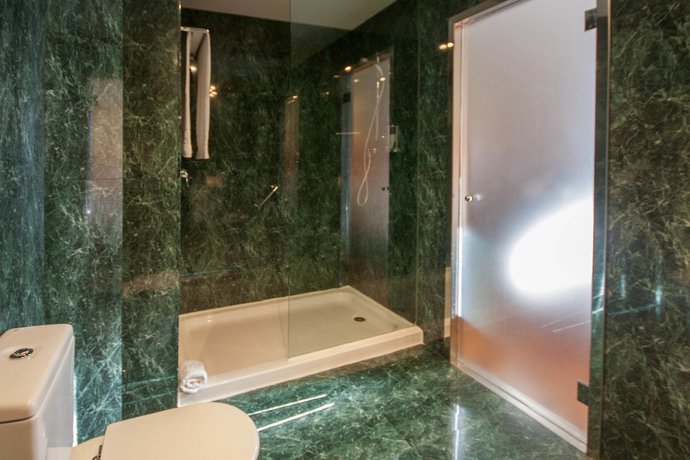 Imagen de la habitación del Hotel B&B Elche. Foto 11