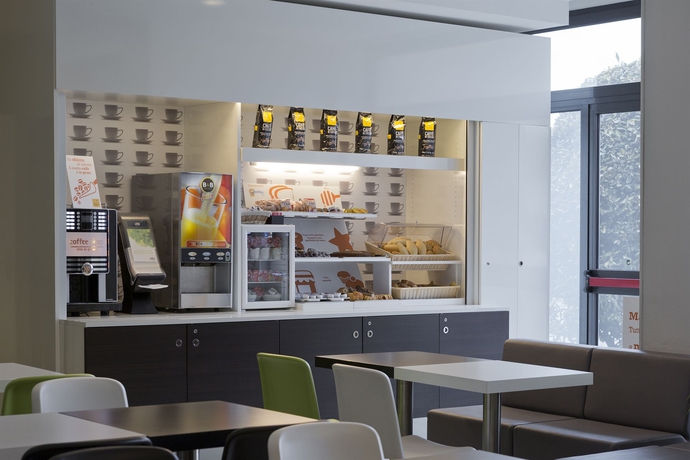 Imagen del bar/restaurante del Hotel B&B Ferrara. Foto 3