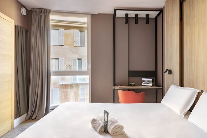 Imagen de la habitación del Hotel B&B Genova City Center. Foto 14