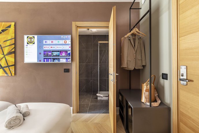 Imagen de la habitación del Hotel B&B Genova City Center. Foto 15