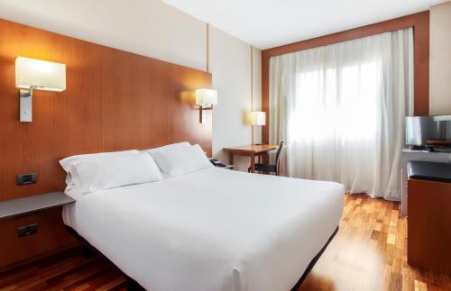 Imagen de la habitación del Hotel B&B Granada Estación. Foto 14