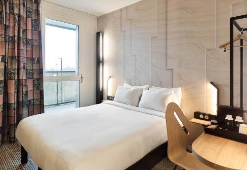 Imagen de la habitación del Hotel B&B HOTEL Versailles Rocquencourt. Foto 18