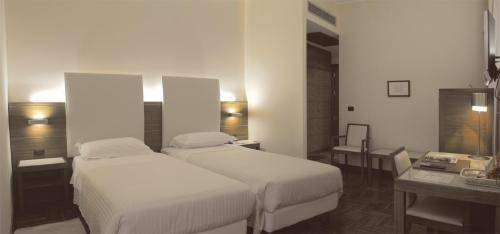 Imagen de la habitación del Hotel B&B Habitat Giussano. Foto 2