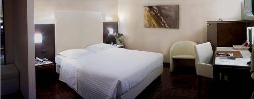 Imagen de la habitación del Hotel B&B Habitat Giussano. Foto 12
