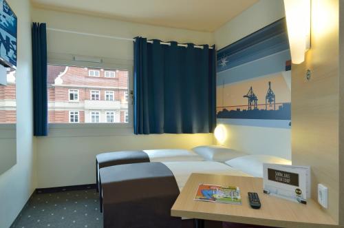 Imagen de la habitación del Hotel B&B Hamburg-Altona. Foto 7