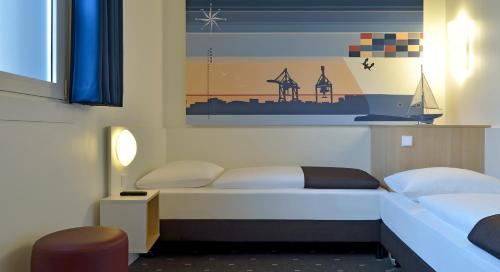 Imagen de la habitación del Hotel B&B Hamburg-Altona. Foto 9