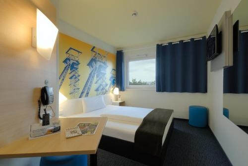 Imagen de la habitación del Hotel B&B Hamm. Foto 6