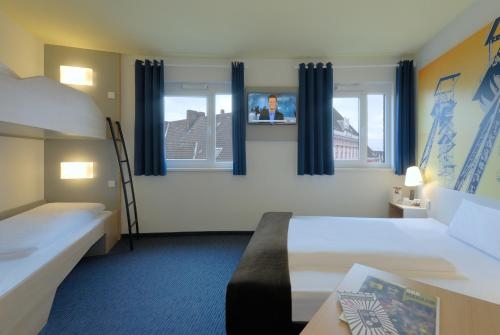 Imagen de la habitación del Hotel B&B Hamm. Foto 9