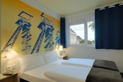 Imagen de la habitación del Hotel B&B Hamm. Foto 10