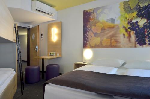 Imagen de la habitación del Hotel B&B Heilbronn. Foto 7