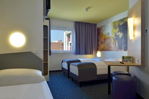 Imagen de la habitación del Hotel B&B Heilbronn. Foto 9