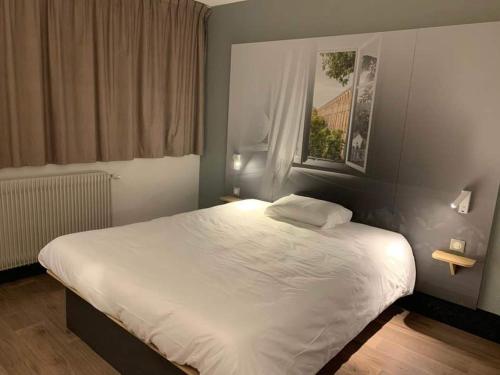 Imagen de la habitación del Hotel B&B H&ocirc;tel Chaumont. Foto 6