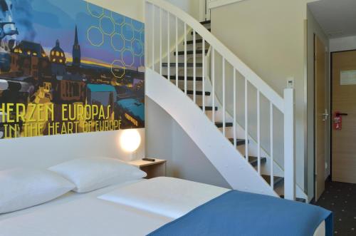 Imagen de la habitación del Hotel B&B Hotel Aachen-Würselen. Foto 20