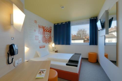 Imagen de la habitación del Hotel B&B Kaiserslautern. Foto 7