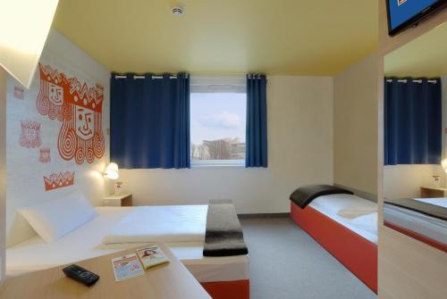 Imagen de la habitación del Hotel B&B Kaiserslautern. Foto 8
