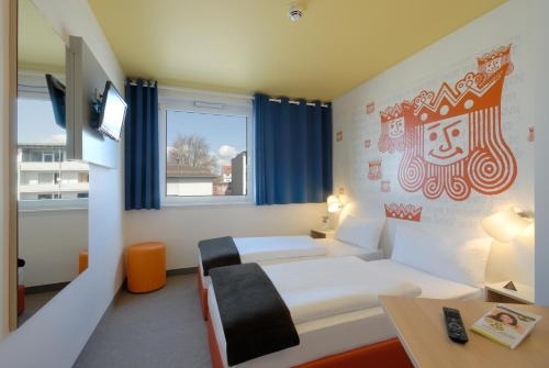 Imagen de la habitación del Hotel B&B Kaiserslautern. Foto 9