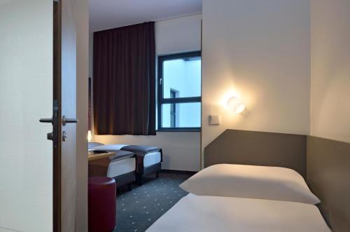 Imagen de la habitación del Hotel B&B Köln-Troisdorf. Foto 6